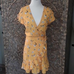 Yellow floral wrap dress